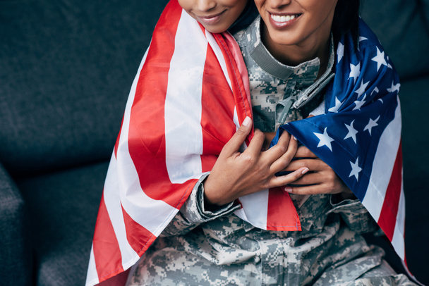 stock-photo-family-wrapped-with-american-flag