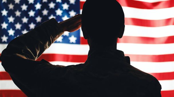 Soldier with Usa Flag On background